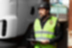 A Security Guard Organizing The Truck stop Reports