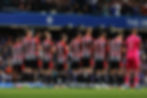 Michail Antonio shooting the ball for West Ham