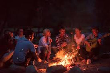 singing with friends aroudn a fire.jpg