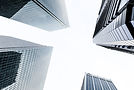 low-angle-view-modern-buildings-against-clear-sky.jpg