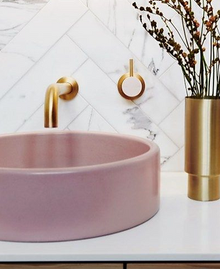 pink washbasin in bathroom
