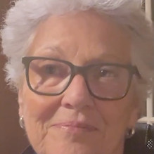 Linda Harris HeadShot white woman with sort grey hair wearing glasses
