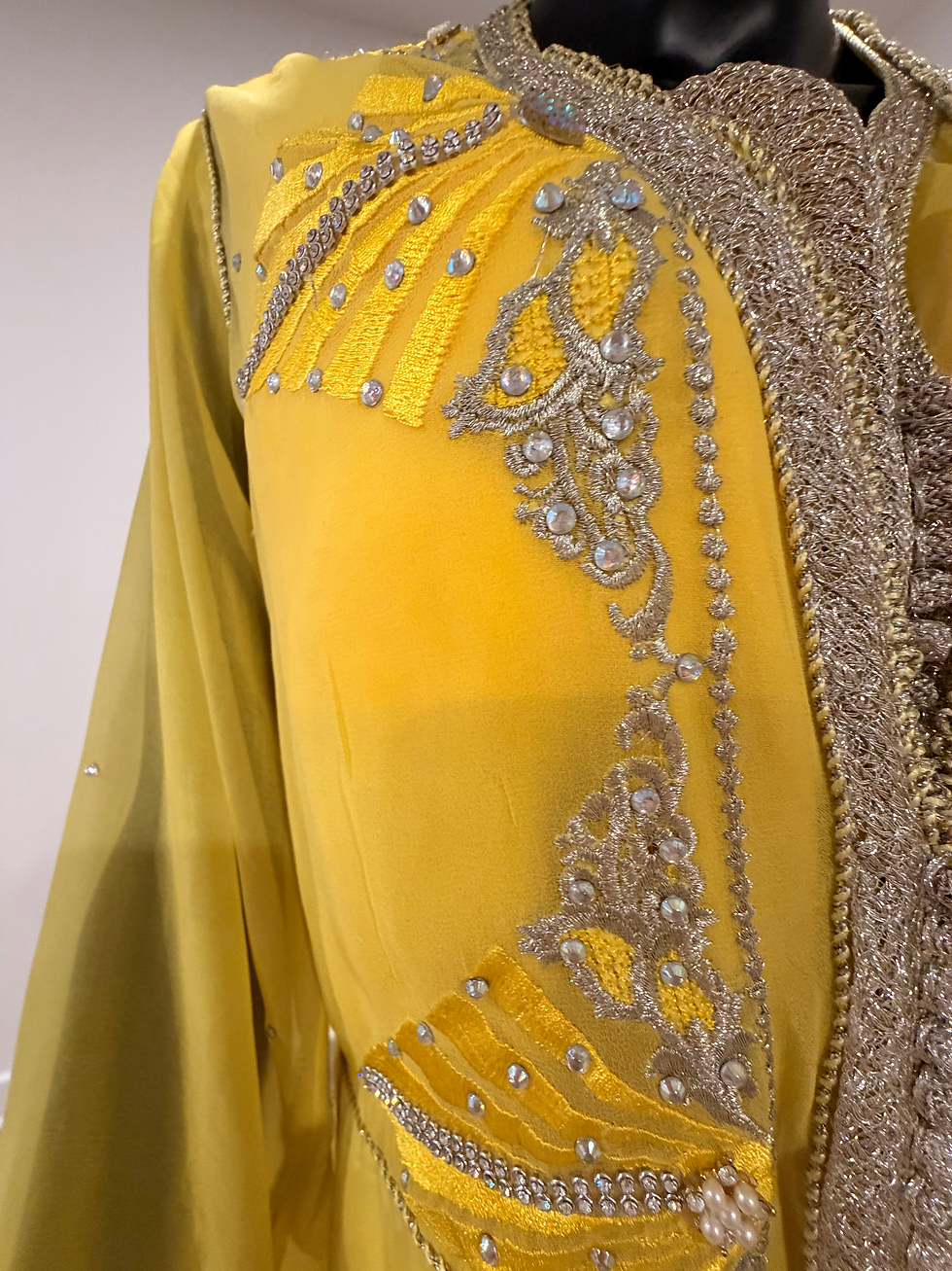 Yellow silk caftan takchita with white diamond embellishment and hand stitched embroidery full length.