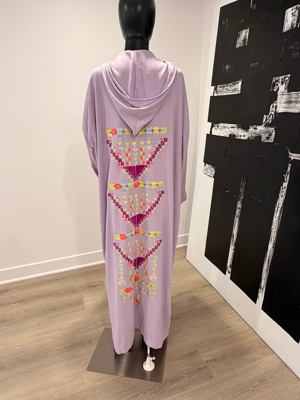 Lavender hooded jellaba shown at an angle, displaying colourful tribal embroidery down the front