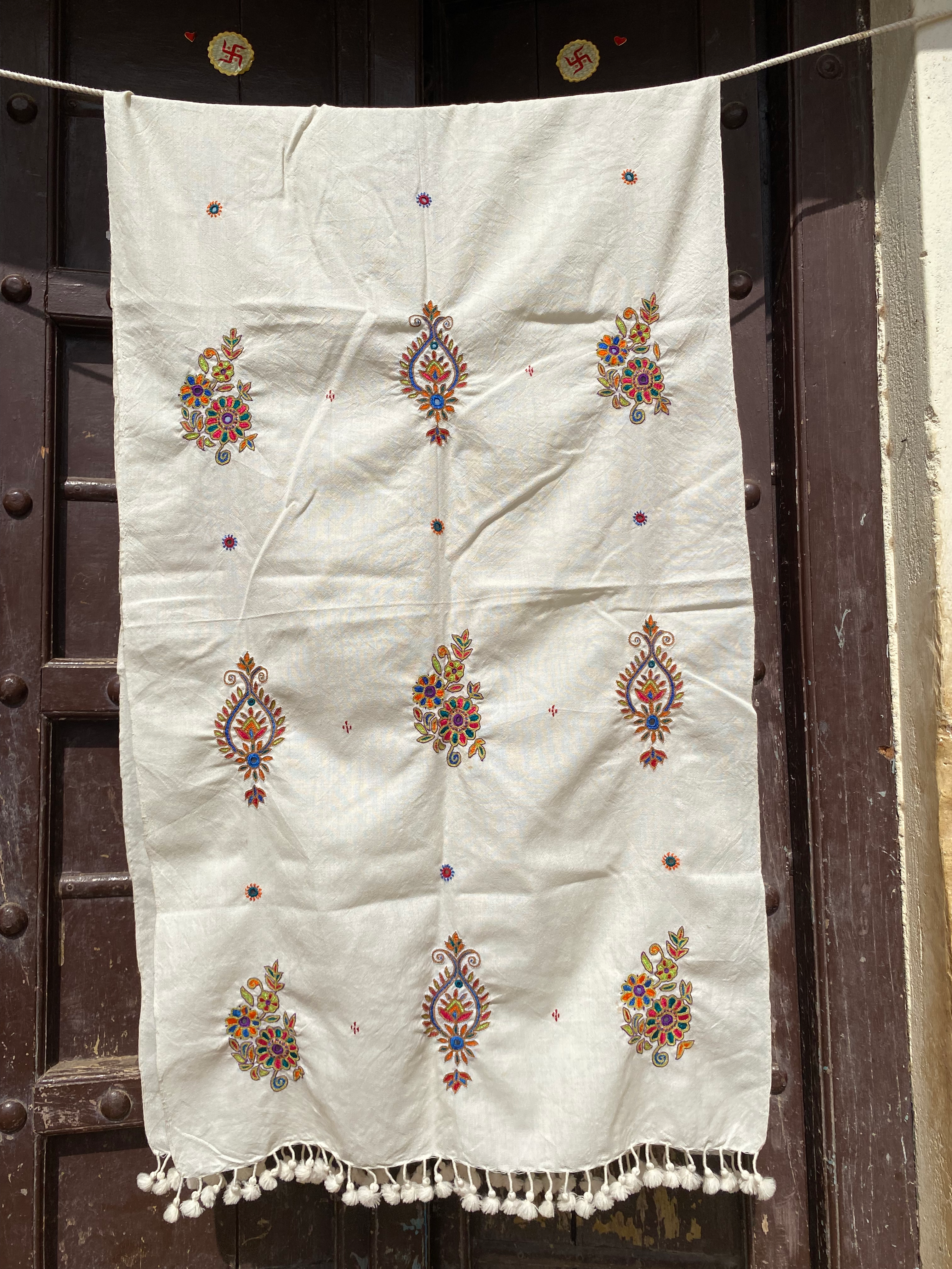 Handwoven stole with kutchi Ahir embroidery involving hours of delicate handwork