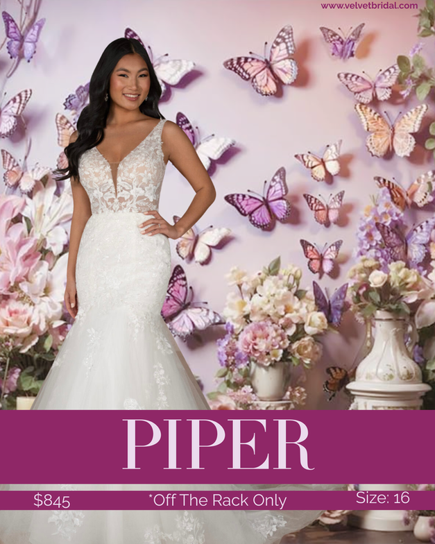 Bride wearing the Piper wedding dress at Velvet Bridal, featuring a lace bodice with a deep V neckline, delicate floral lace detailing, and a fitted silhouette with a soft, flowing skirt, photographed against a romantic floral backdrop.