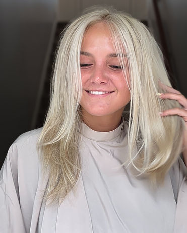 Platinum blonde tone refresh and trim for a clean, confident look by MissMeHairCo.