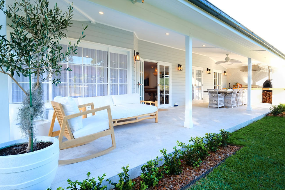 A Hamptons-style outdoor living space and kitchen