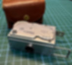 The Mamiya-16 with its leather case