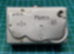 The top face of the Mamiya-16 showing the controls and the intriguing curves of the top plate.