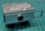 Pulling out the slider at the front reveals the lens.