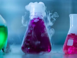 Coloured chemicals bubbling away in flasks