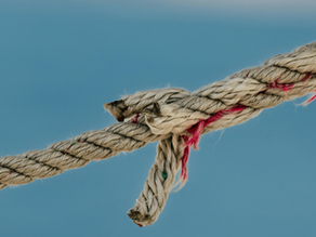 an image of a fraying rope