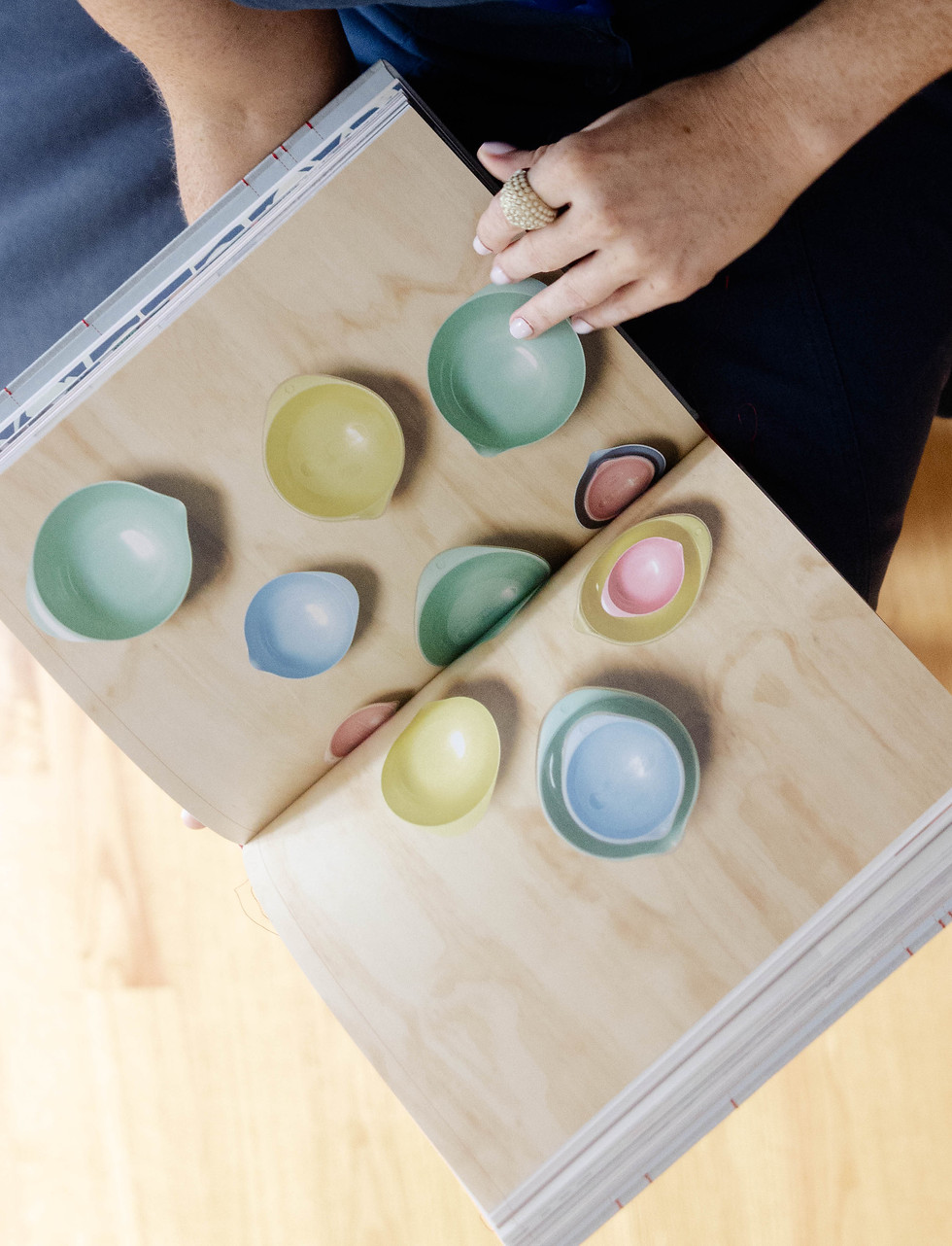 Designer reviewing stoneware