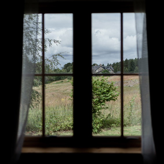 View from a window across fields