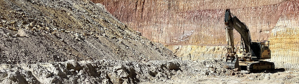 Excavator in pit.jpg