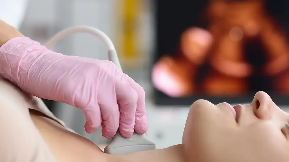 Doctor doing an ultrasound check on women’s neck to check for neck lump symptoms.