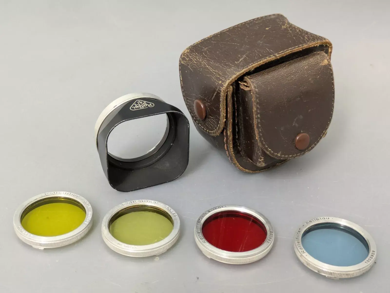 Rolleiflex Filter Set And Lens Hood Bay1 Bayonet 1. In a leather case.