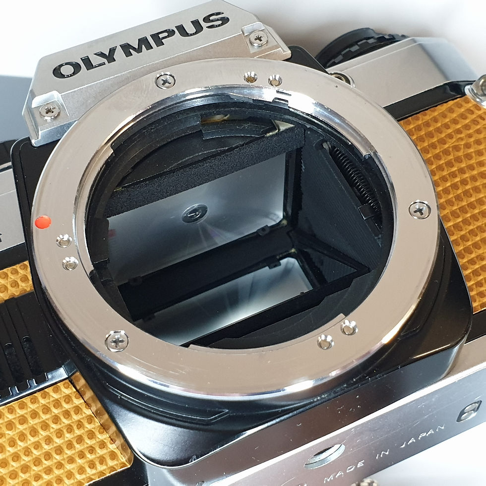 Thumbnail: Olympus OM10 with Zuiko  MC AUTO-S 50mm 1.8 lens. With new TAN leather covering.