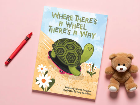Children's book cover Where There's a Wheel There's a Way with a smiling turtle on a skateboard, beside a red crayon and teddy bear.