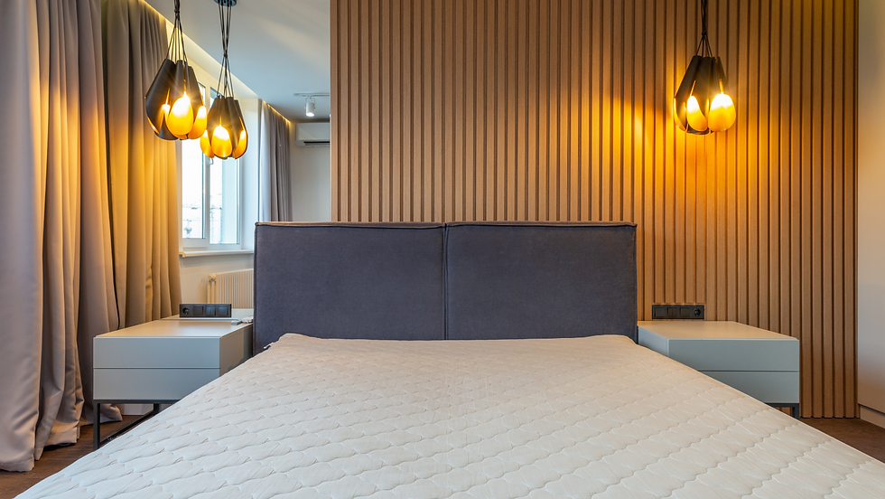 Bedroom with hanging pendant lights