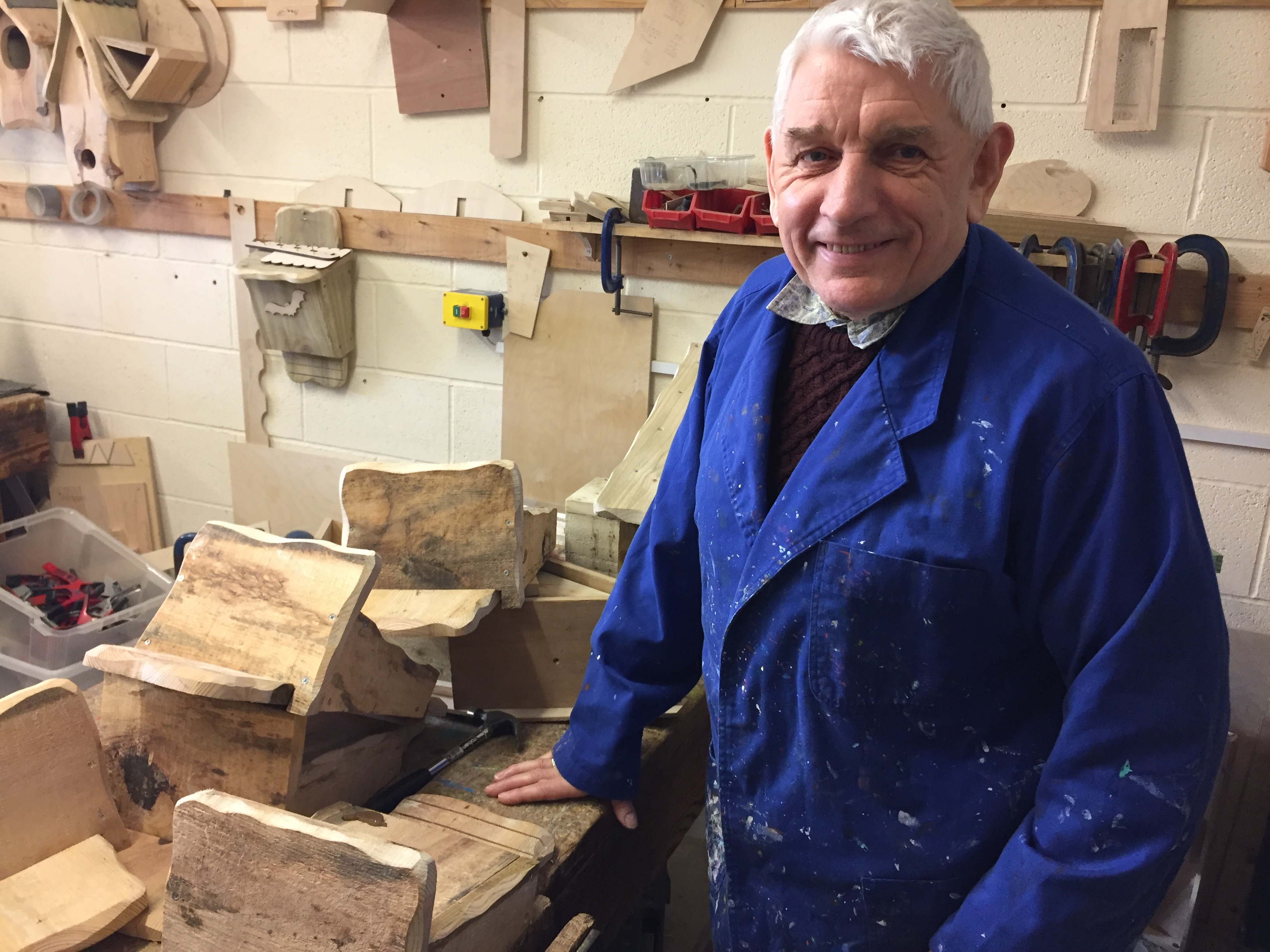 Ian loves working in the garden at the workshops.