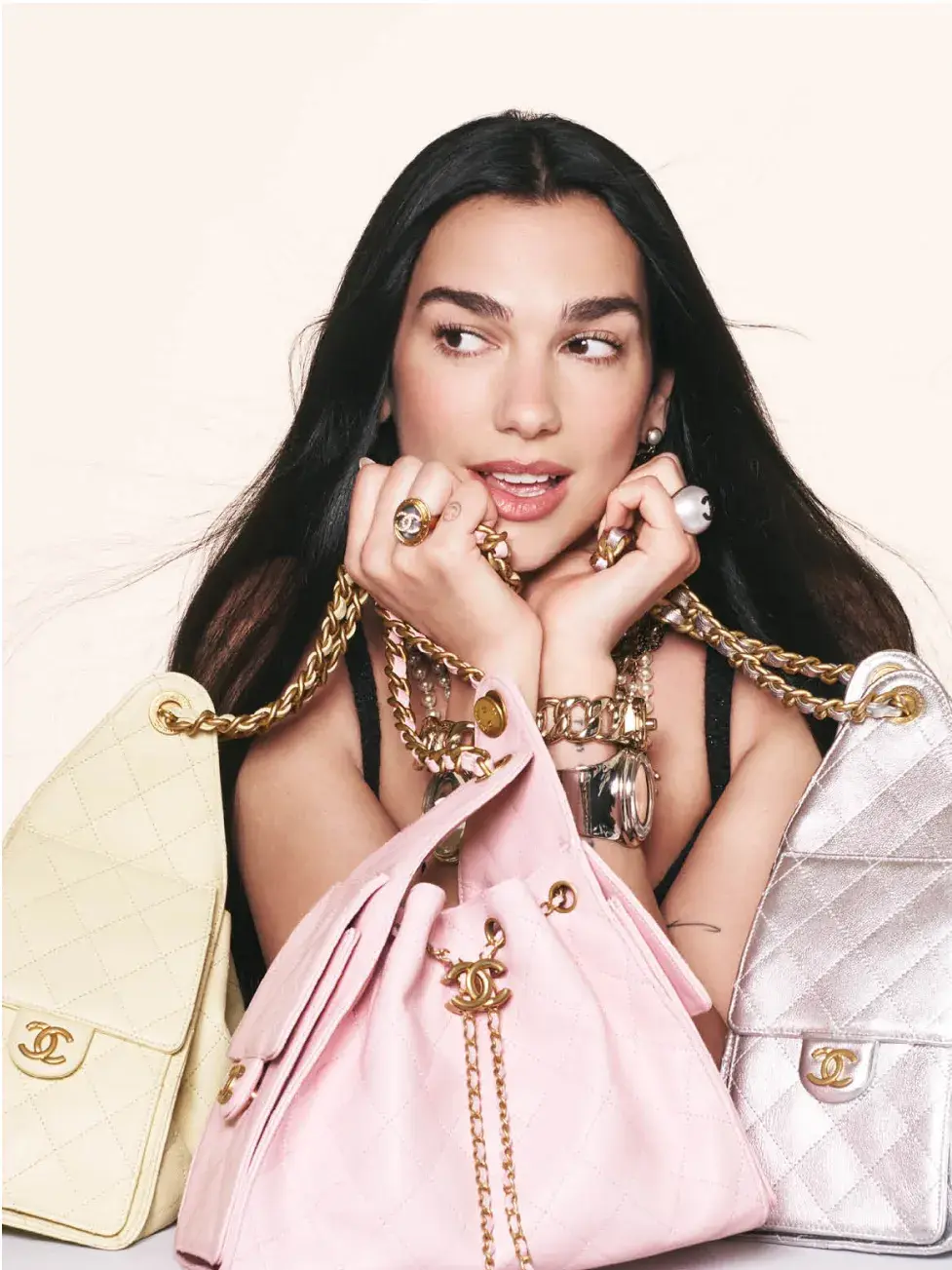 Dua Lipa with Chanel 25 Handbags