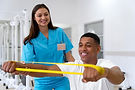 medical-assistant-helping-patient-with-physiotherapy-exercises.jpg