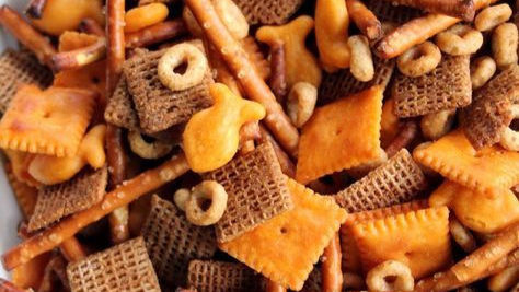 Close-up view of a colorful platter with assorted bits and bites snacks arranged neatly