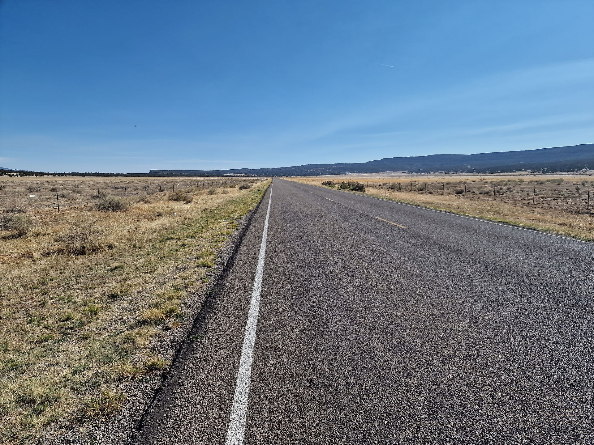 We reached the highway, where the Cebolla alternate joins the official CDT again. This road is gonna lead us all the way to Grants, around 30 miles....