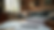 Eye-level view of a cozy living space with stacks of immigration documents