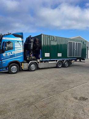 Large building unit, being transported on the back of a HIAB truck