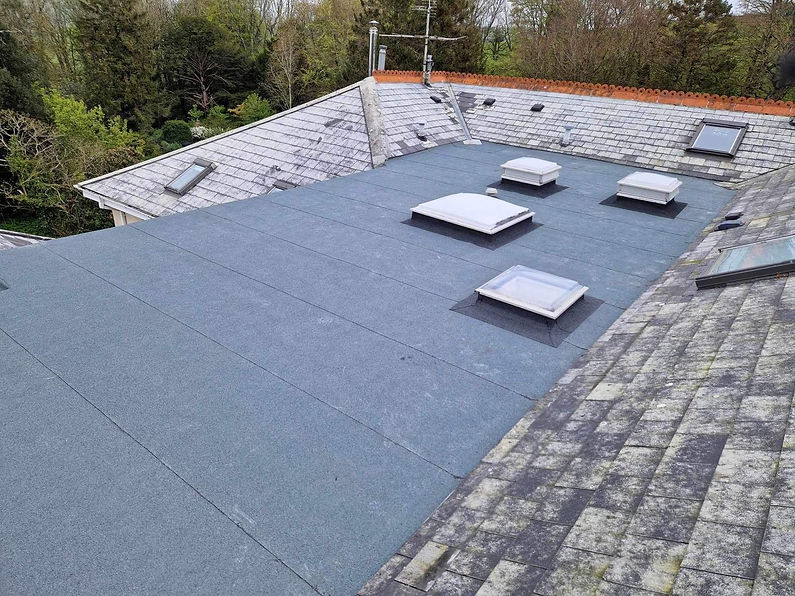 New flat roof installed with skylights