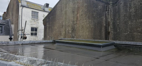 Close up image of the existing felt roofing on a customers home