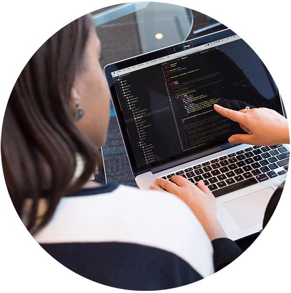 Engineers reviewing ServiceNow workflow automation code
