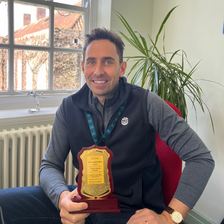 Ollie Receives Token of Appreciation Award