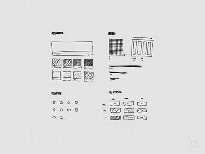 skizzen eines Design Systems auf karierten Hintergrund in monotonen Grautönen
