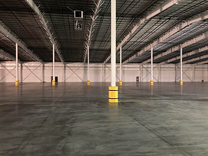 large-empty-warehouse-v0-606lbzsc2xca1.jpg