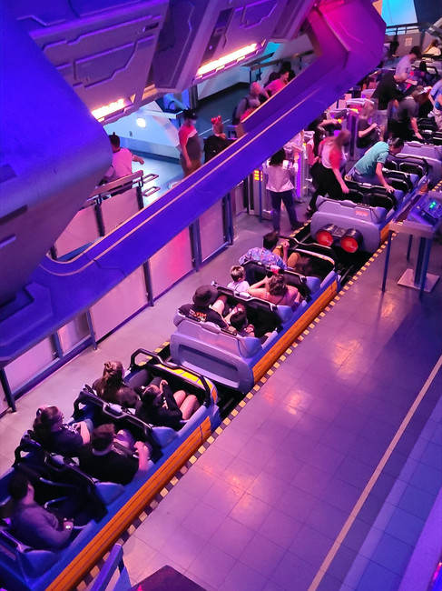 Loading station of Space Mountain at Disneyland Park - they are double seaters 