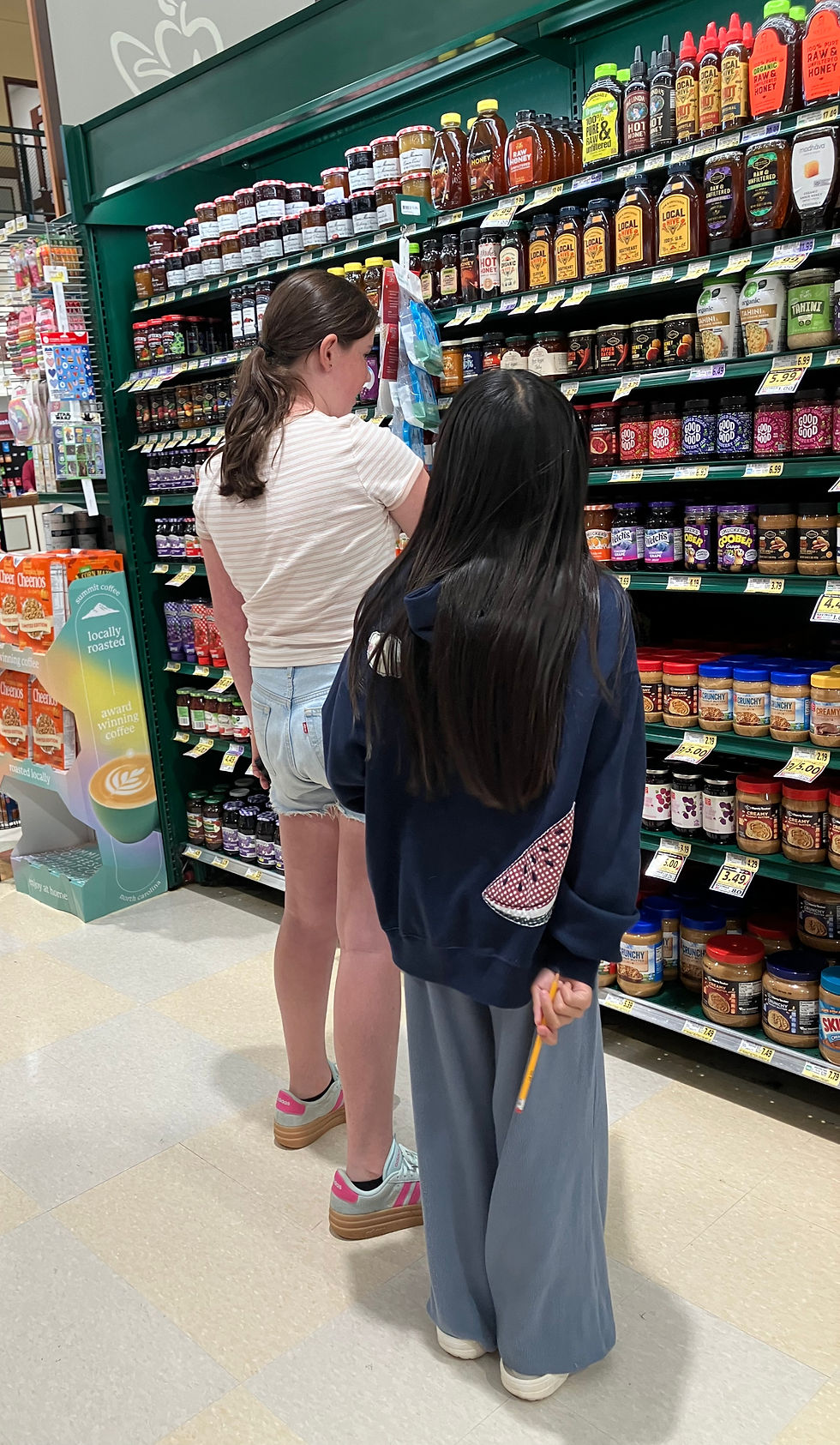 Pairs of students are given budgets and must shop for a week's worth of groceries. Some pairs have an abundance of finances while others are unable to meet basic needs.