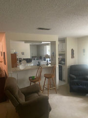 Transitional living space with fresh paint and new flooring, Charlotte NC renovation