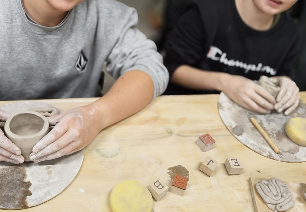 Eye-level view of a pottery wheel with clay ready to be shaped