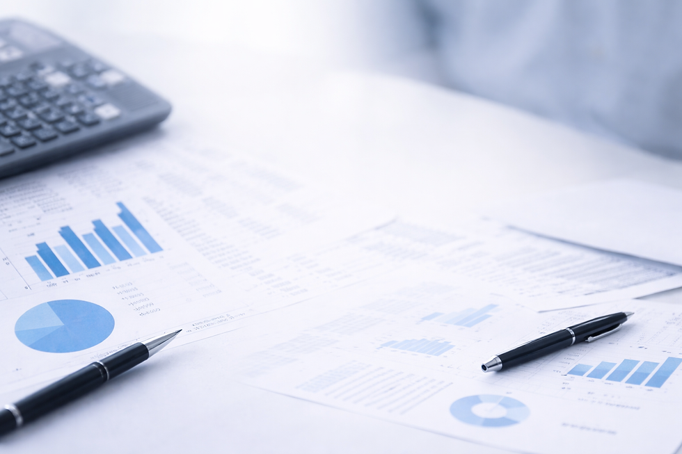 Financial documents with charts and graphs used for analyzing credit card processing fees and business expenses