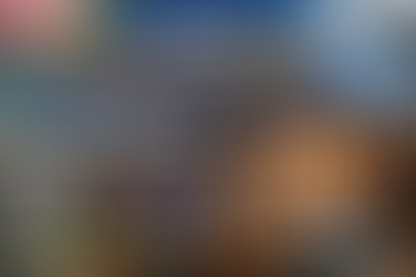 HVAC technician servicing air conditioner and furnace to prepare for seasonal maintenance