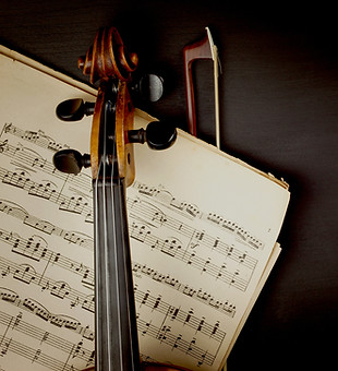 Violin over Sheet Music
