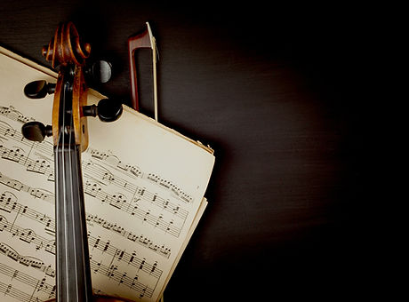 Violin over Sheet Music