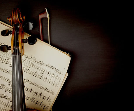 Violin over Sheet Music