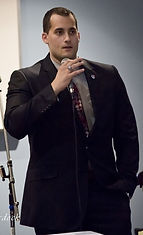 Giving speech at open house for Financial business