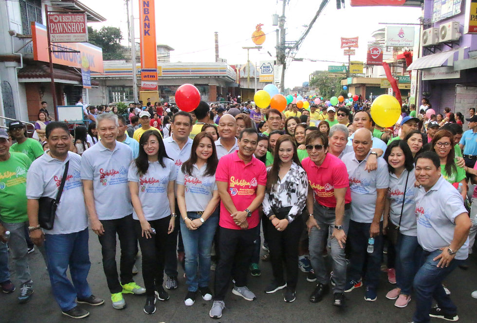 Mayor Dan Fernandez, Vice Mayor Arnold Arcillas and City Council, together with Cong. Arlene B. Arcillas during the parade.