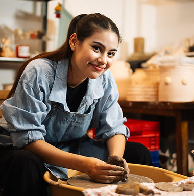 professional-craftsman-potter-making-jug-clay-potter-wheel-circle-workshop_edited.jpg
